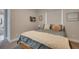 Bedroom with plush bedding and a neutral color palette at 5 Broadmoor Ln, Rotonda West, FL 33947