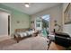 Bedroom with outdoor access and built-in workspace at 5 Broadmoor Ln, Rotonda West, FL 33947