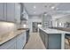 Contemporary kitchen featuring stainless steel appliances and granite countertops at 5 Broadmoor Ln, Rotonda West, FL 33947