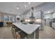 Spacious kitchen features a large island, stainless steel appliances, and breakfast area at 5 Broadmoor Ln, Rotonda West, FL 33947