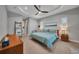 Comfortable main bedroom with a king-size bed and an ensuite bathroom at 5 Broadmoor Ln, Rotonda West, FL 33947
