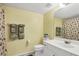 Simple bathroom with shower and seashell theme at 5725 Greenwood Ave # 8101, North Port, FL 34287