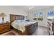 Spacious bedroom with large window and king-size bed at 5725 Greenwood Ave # 8101, North Port, FL 34287