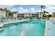 Inviting community pool with ample lounge chairs at 5725 Greenwood Ave # 8101, North Port, FL 34287