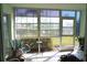 Bright screened porch overlooking the community at 5725 Greenwood Ave # 8101, North Port, FL 34287