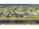 Aerial view of a property with a waterway at 604 Boundary Blvd, Rotonda West, FL 33947