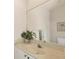 Bathroom featuring a large mirror, bright vanity and decor at 604 Boundary Blvd, Rotonda West, FL 33947