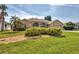 Charming home with lush landscaping at 604 Boundary Blvd, Rotonda West, FL 33947