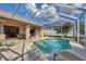 Beautiful screened-in pool area perfect for outdoor entertaining and enjoying the Florida sunshine at 604 Boundary Blvd, Rotonda West, FL 33947