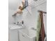 Bright laundry room with a sink, shelving, washer, and dryer at 6125 Higgins Ln, Englewood, FL 34224