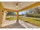 Screened patio with yellow trim provides views of the property at 6125 Higgins Ln, Englewood, FL 34224