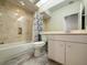 Bathroom with bathtub, toilet and vanity at 6730 Greenview Ln, Englewood, FL 34224