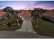 Attractive single-story home with a tile roof and landscaped yard at 6730 Greenview Ln, Englewood, FL 34224