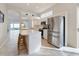 Modern kitchen with stainless steel appliances and island at 6730 Greenview Ln, Englewood, FL 34224