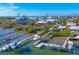 Aerial view of waterfront community with numerous homes and boat docks at 8888 Bay St, Placida, FL 33946