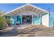 Large deck with view into the home's interior at 8888 Bay St, Placida, FL 33946