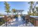 Deck with seating areas and views of the waterfront at 8888 Bay St, Placida, FL 33946