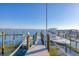 Wooden dock with boat slips and waterfront views at 8888 Bay St, Placida, FL 33946