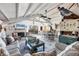 Bright living room with vaulted ceiling and open floor plan at 8888 Bay St, Placida, FL 33946
