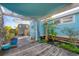 Outdoor shower area with lush tropical plants at 8888 Bay St, Placida, FL 33946