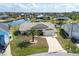 Attractive home on canal with lush landscaping at 9238 Melody Cir, Port Charlotte, FL 33981
