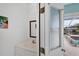 Small bathroom with single vanity and pool view at 9238 Melody Cir, Port Charlotte, FL 33981