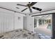 Bedroom with pool access and checkered floors at 9238 Melody Cir, Port Charlotte, FL 33981