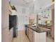 Modern kitchen with breakfast bar and view at 9238 Melody Cir, Port Charlotte, FL 33981