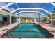 Spacious pool and spa with screened enclosure at 9238 Melody Cir, Port Charlotte, FL 33981