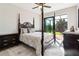 Bedroom boasts backyard access and natural lighting at 9533 Arnaz Cir, Port Charlotte, FL 33981