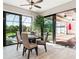 Dining area features a view of the pool and outdoor lanai at 9533 Arnaz Cir, Port Charlotte, FL 33981