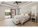 Bright main bedroom has backyard access and lots of natural light at 9533 Arnaz Cir, Port Charlotte, FL 33981