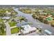 Aerial view of the waterfront neighborhood, with a canal running through it at 9548 Applin Cir, Port Charlotte, FL 33981
