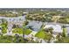 Stunning aerial view of a waterfront neighborhood with homes along a picturesque canal at 9548 Applin Cir, Port Charlotte, FL 33981
