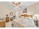 Comfortable bedroom with a ceiling fan, a cozy chair, and decor that creates a peaceful and relaxing atmosphere at 9548 Applin Cir, Port Charlotte, FL 33981