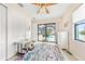 A bonus room opens up to a pool and waterway view, and contains a nice rug and plenty of space at 9548 Applin Cir, Port Charlotte, FL 33981