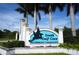Keystone's South Gulf Cove waterfront community entrance sign surrounded by palm trees at 9548 Applin Cir, Port Charlotte, FL 33981