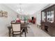 Open concept dining room flows into the living area at 9900 Fiddlers Green Cir # 137, Rotonda West, FL 33947