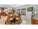 Formal dining room with a wood table and chairs, situated near the kitchen at 1080 Bayshore Dr, Englewood, FL 34223