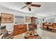 Bright living room featuring hardwood floors and vintage furniture at 1080 Bayshore Dr, Englewood, FL 34223