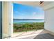 Balcony offers stunning views of the bay with a view of the water at 1375 Beach Rd # 109, Englewood, FL 34223