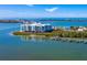 Waterfront condo featuring a private dock, lush greenery, and stunning views of the Gulf at 1375 Beach Rd # 109, Englewood, FL 34223