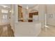 Well-lit kitchen featuring white countertops, wood cabinets, and modern appliances at 14405 Silver Lakes Cir, Port Charlotte, FL 33953