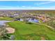 Aerial view of the community, water features and golf course at 14429 Bridgeview Ln, Port Charlotte, FL 33953