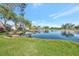 Scenic view of the beautiful lake and other houses at 14429 Bridgeview Ln, Port Charlotte, FL 33953