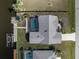 Aerial view of home showcasing the pool area and private dock on the canal at 15524 Ruston Cir, Port Charlotte, FL 33981