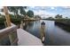 Dock overlooking the canal in this waterfront community at 1586 Overbrook Rd, Englewood, FL 34223