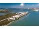 Breathtaking aerial view of beachfront condos with bay and bridge views at 1591 Beach Rd # 403, Englewood, FL 34223