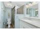 Updated bathroom with tile flooring and walk-in shower at 1591 Beach Rd # 403, Englewood, FL 34223