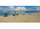 Relaxing beach scene with people enjoying the sun and ocean at 1591 Beach Rd # 403, Englewood, FL 34223